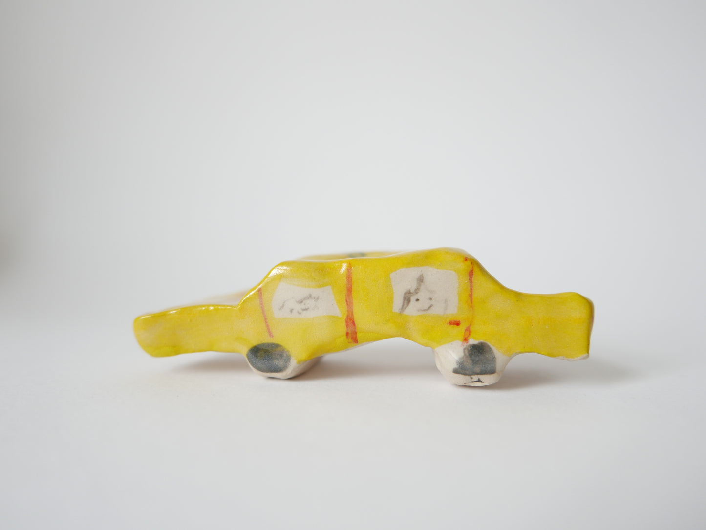 Yellow Car Carrying Bikes