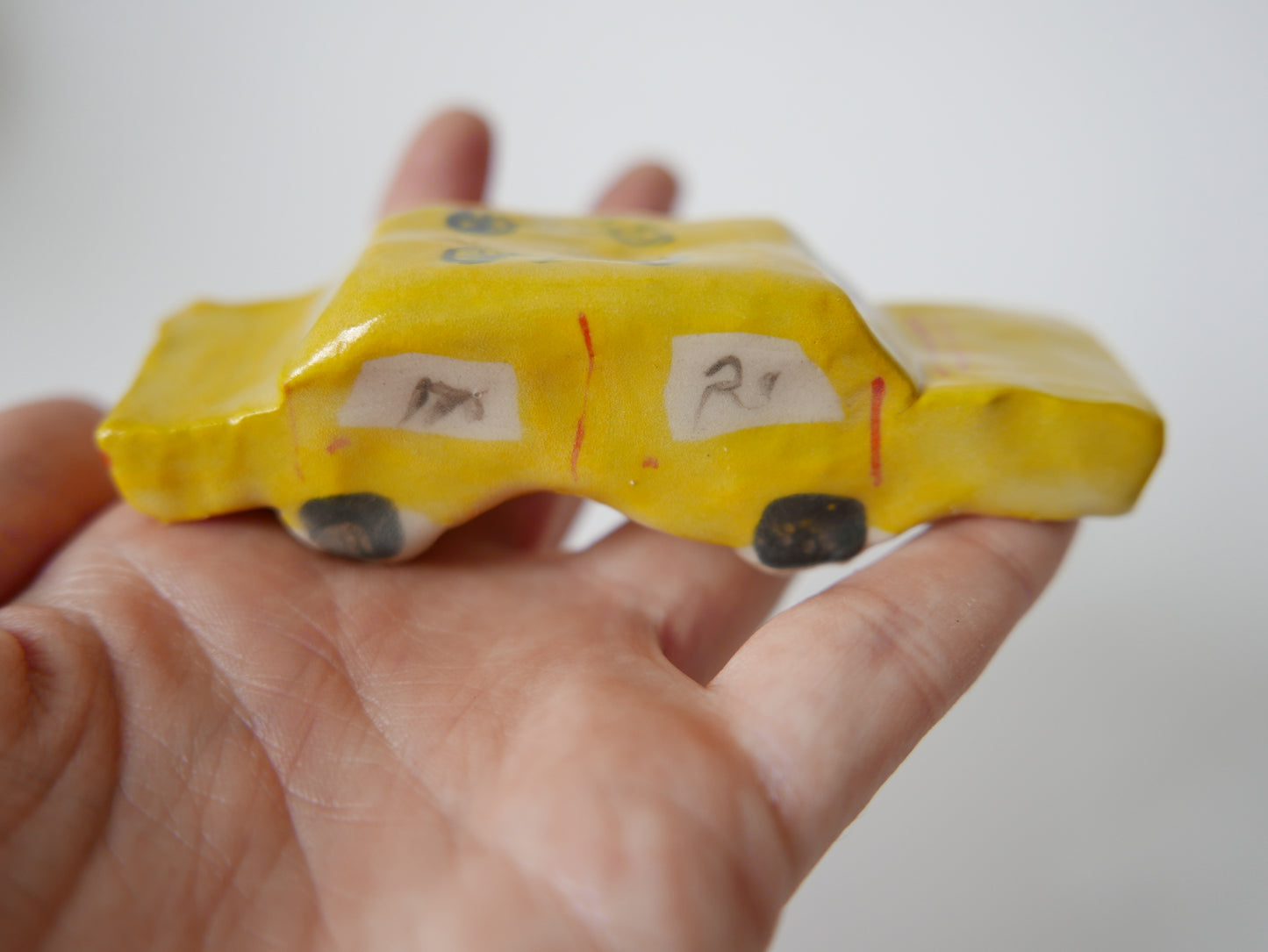 Yellow Car Carrying Bikes