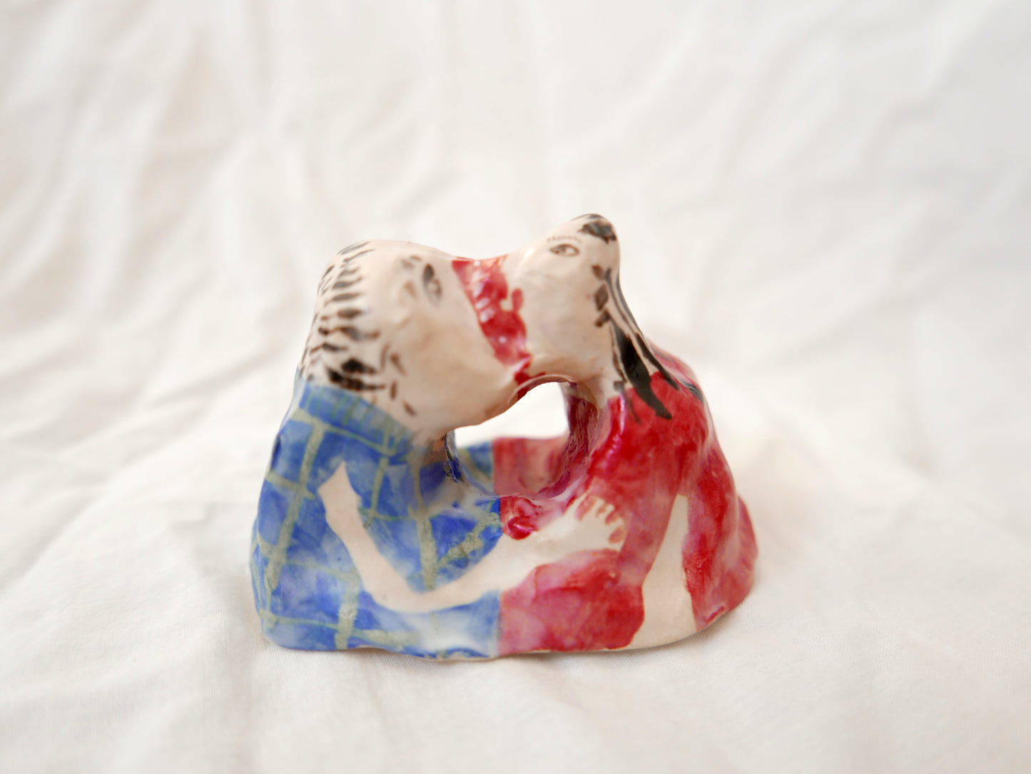 Kissers In Blue and Red