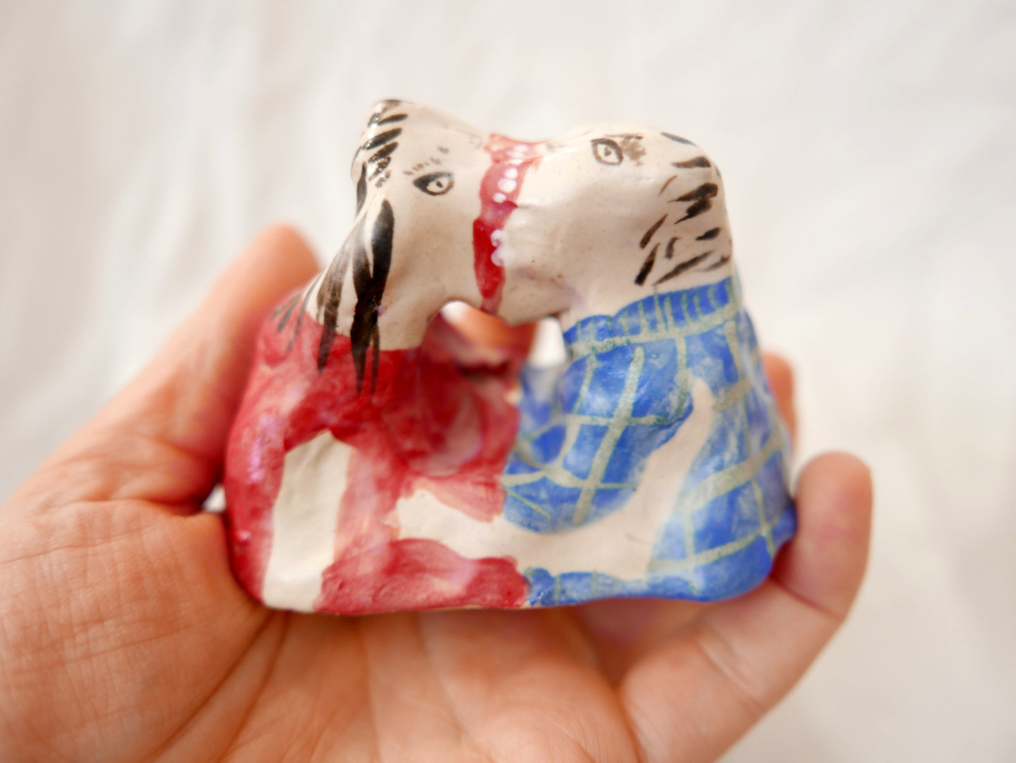 Kissers In Blue and Red