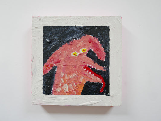 Pink poodle yellow eyes tongue out