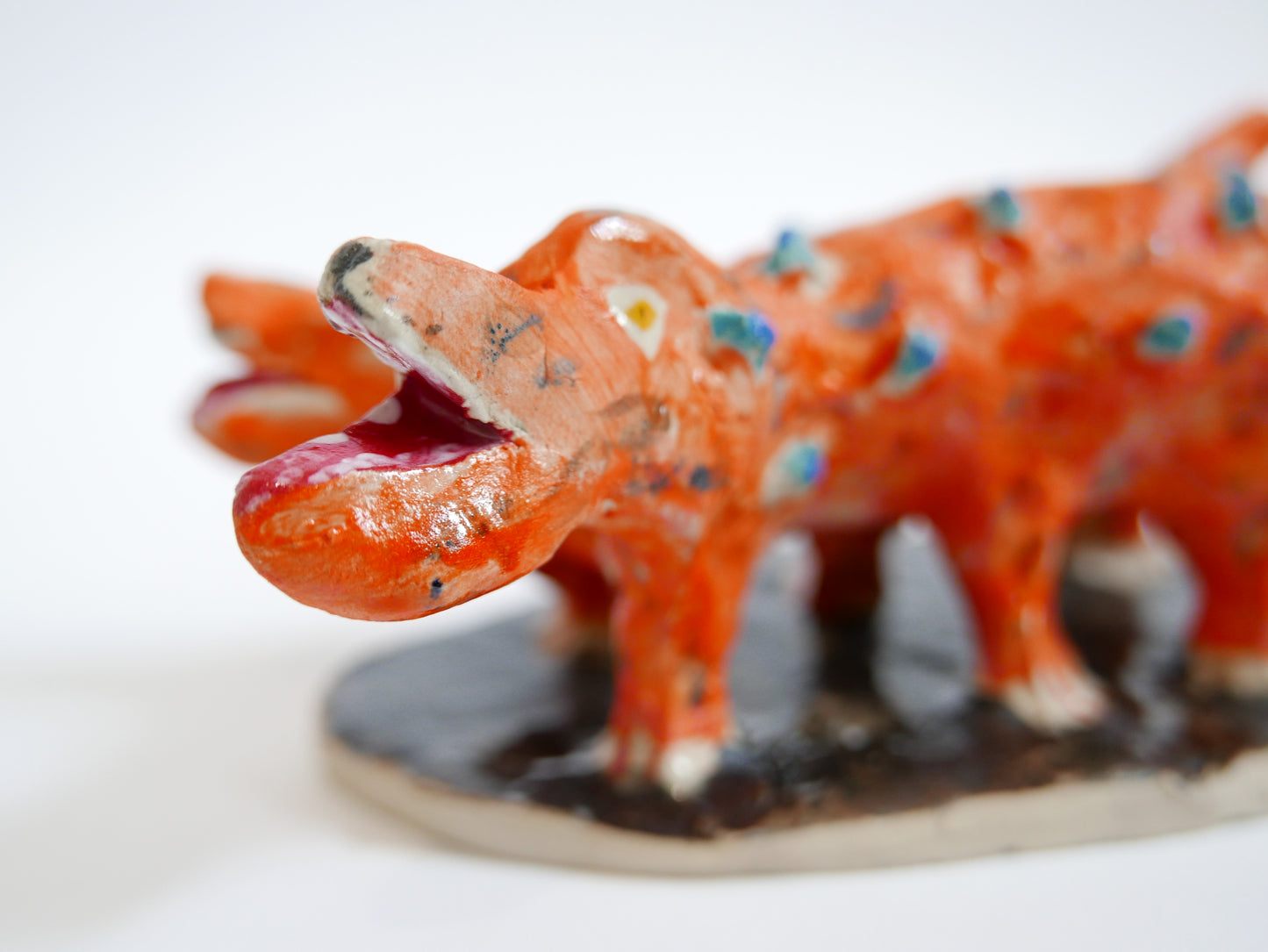 Orange Dog with Blue Chicken Pox and Four Heads and Six Feet