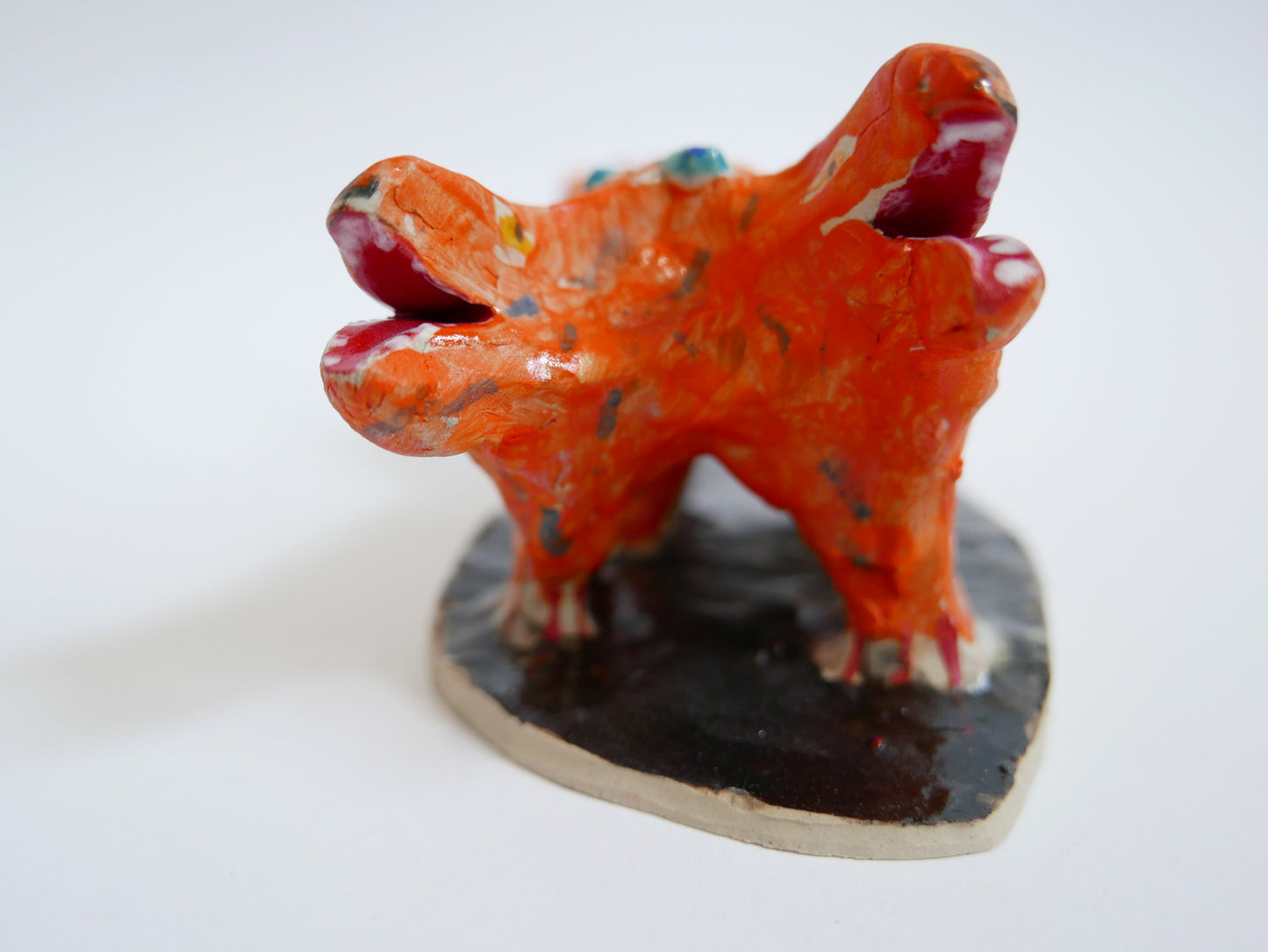 Orange Dog with Blue Chicken Pox and Four Heads and Six Feet