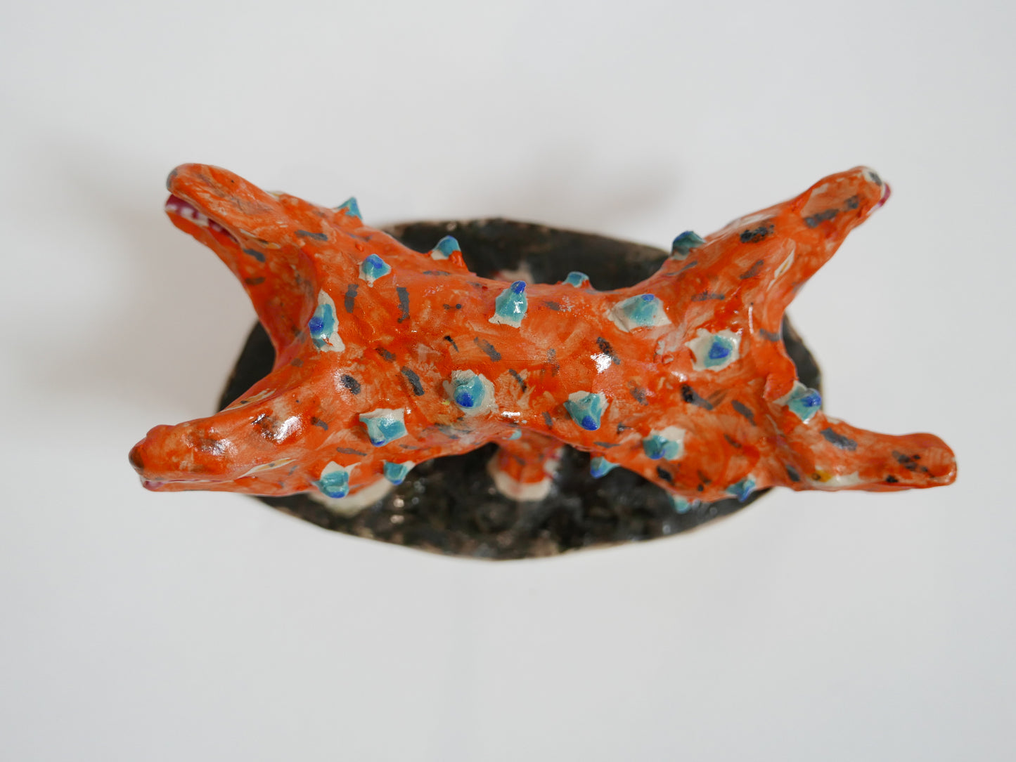 Orange Dog with Blue Chicken Pox and Four Heads and Six Feet