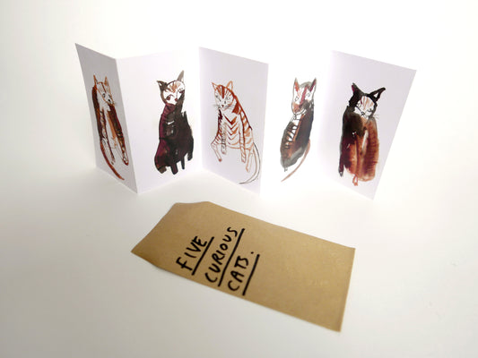 FIVE CURIOUS CATS